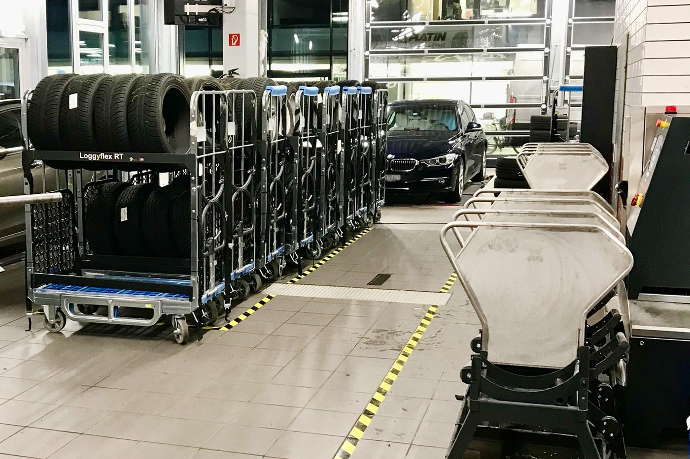 Loggyflex RT 255 trolleys with tyres lined up in the workshop hall